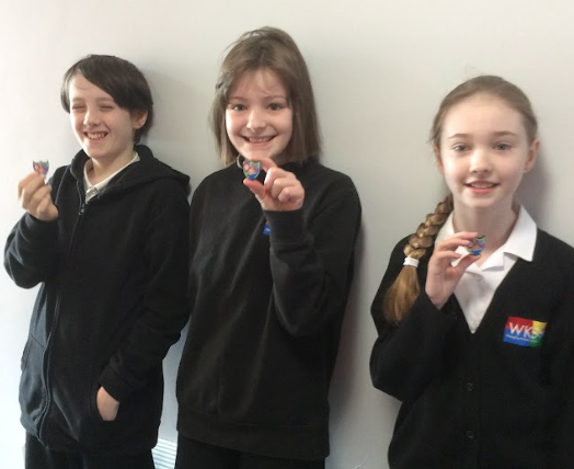 Adventurers' pupils with their badges